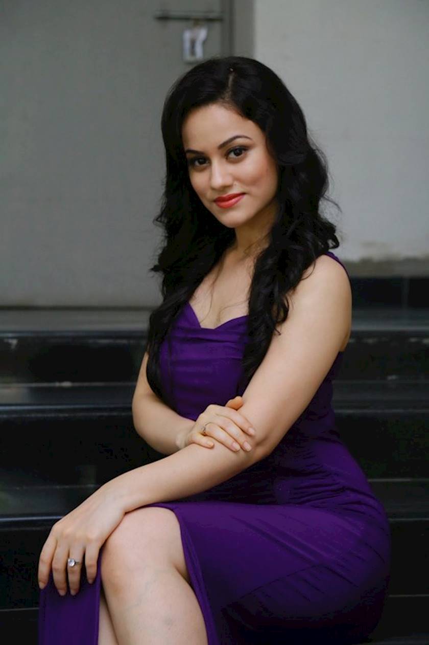 Urvashi Pardeshi looking very hot in purple dress